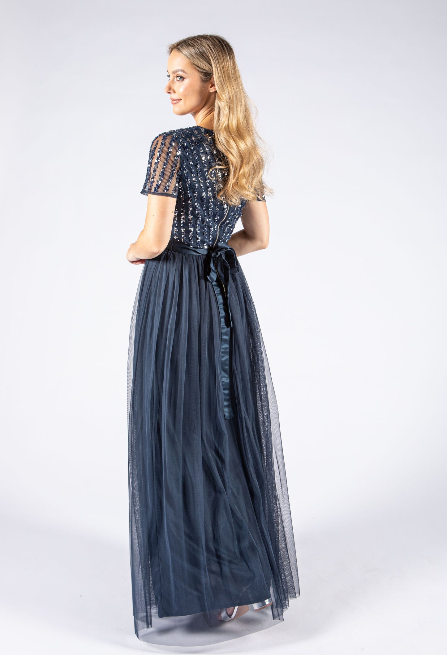 NAVY V NECK SEQUIN AND TULLE DRESS WITH TIE WAIST