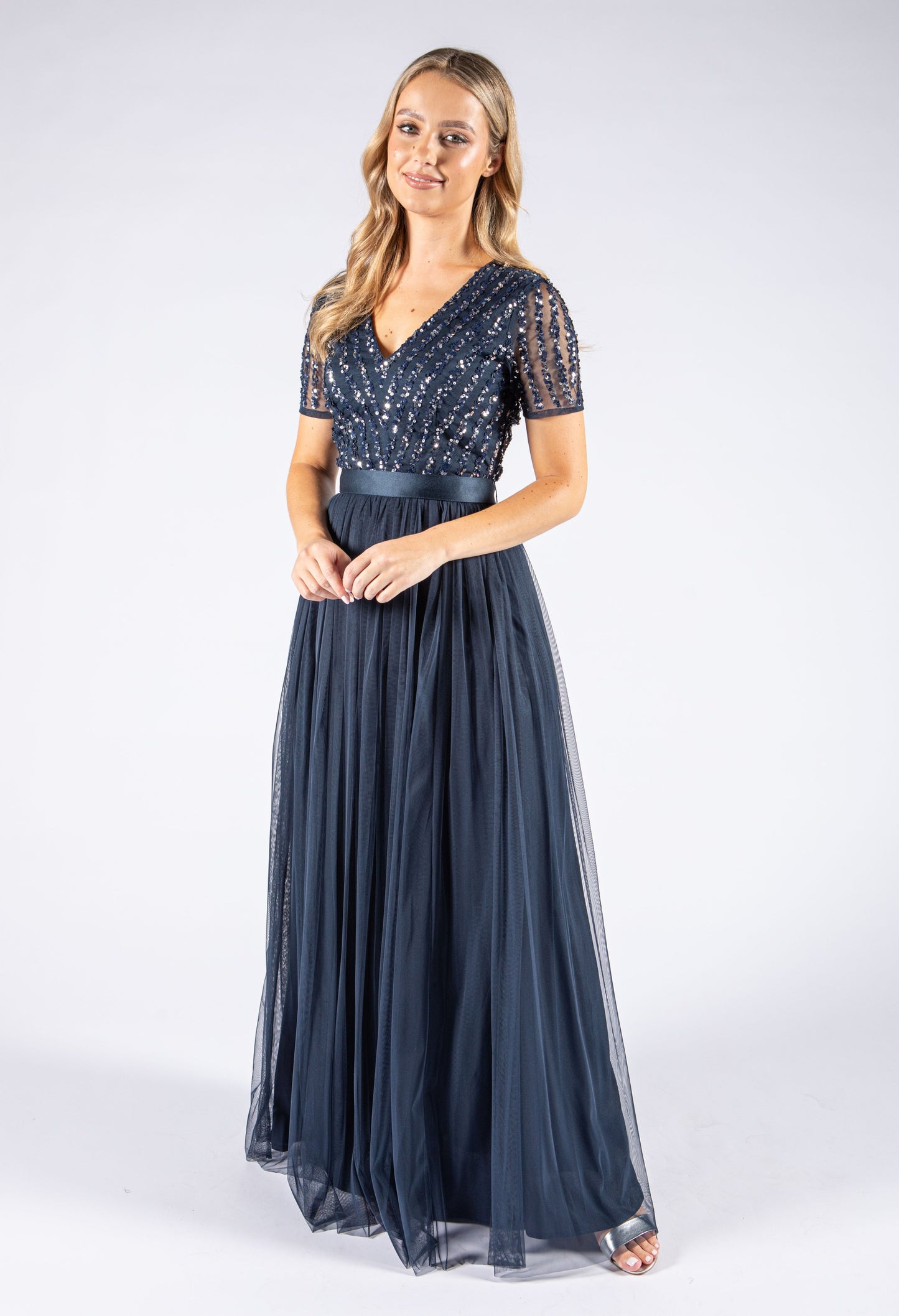 NAVY V NECK SEQUIN AND TULLE DRESS WITH TIE WAIST