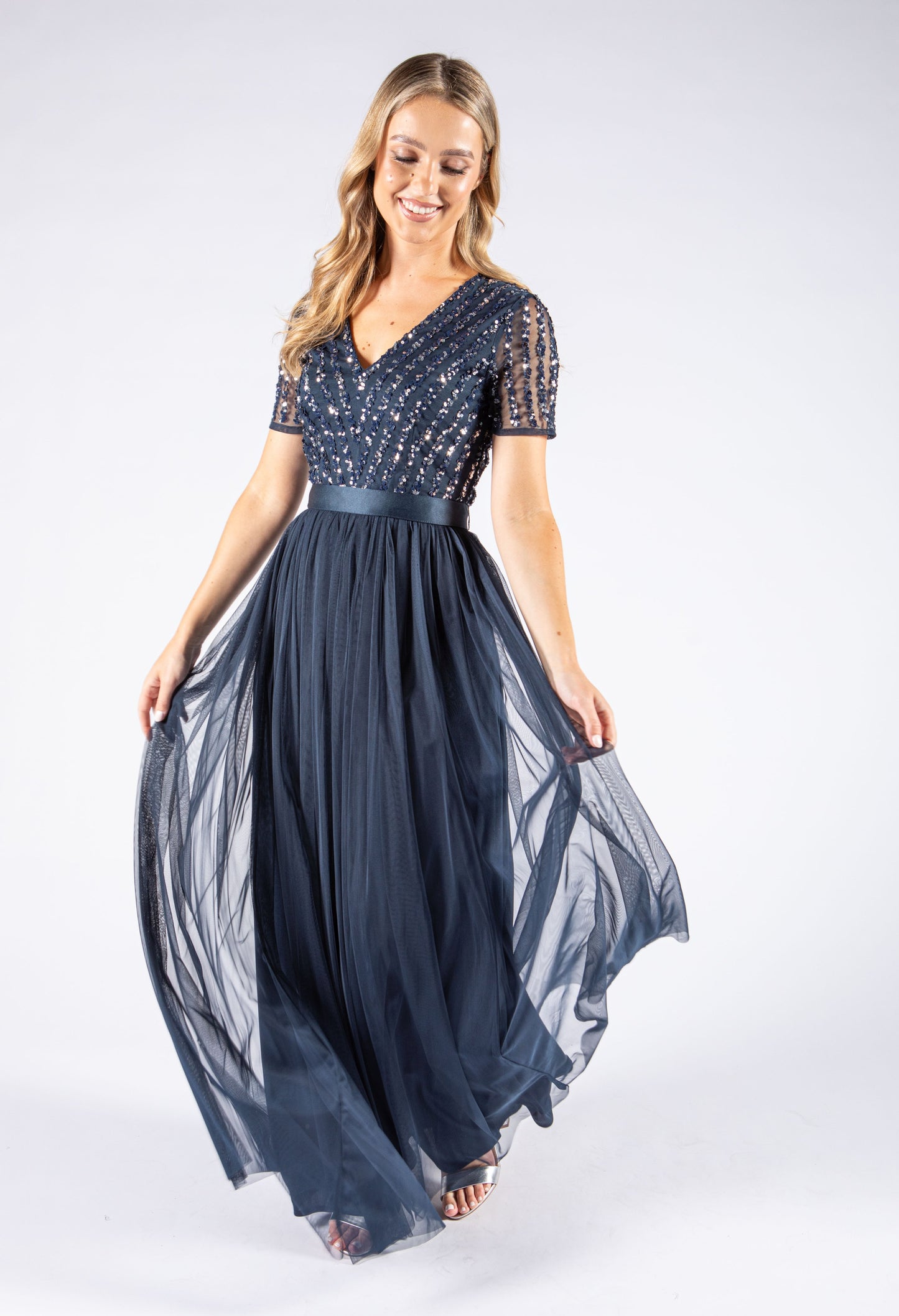 NAVY V NECK SEQUIN AND TULLE DRESS WITH TIE WAIST