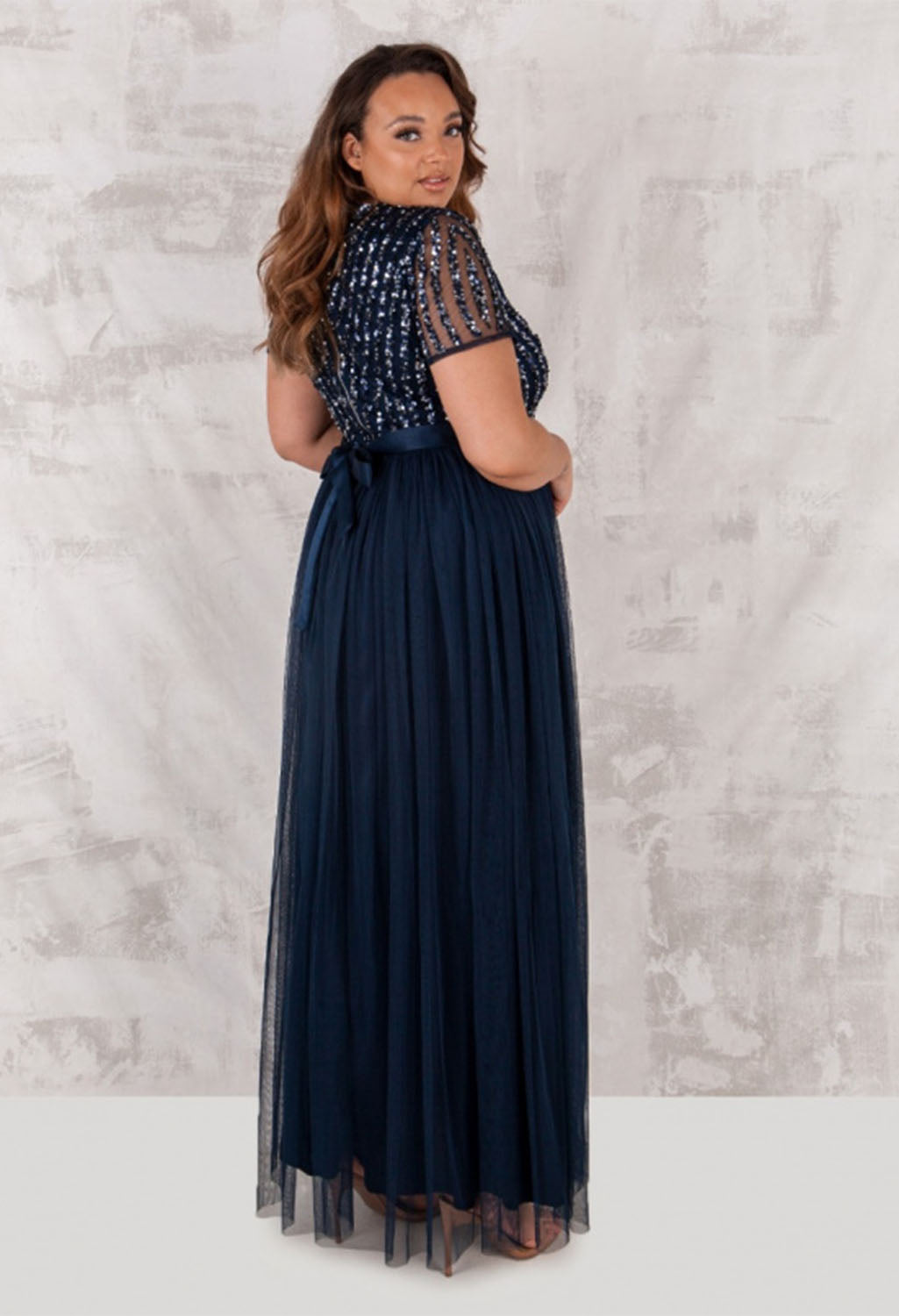 NAVY V NECK SEQUIN AND TULLE DRESS WITH TIE WAIST