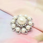 Silver pearl brooch