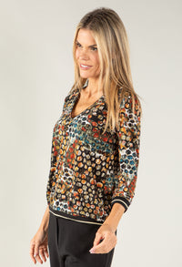 Circle Print V Neck Top