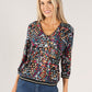 Circle Print V Neck Top