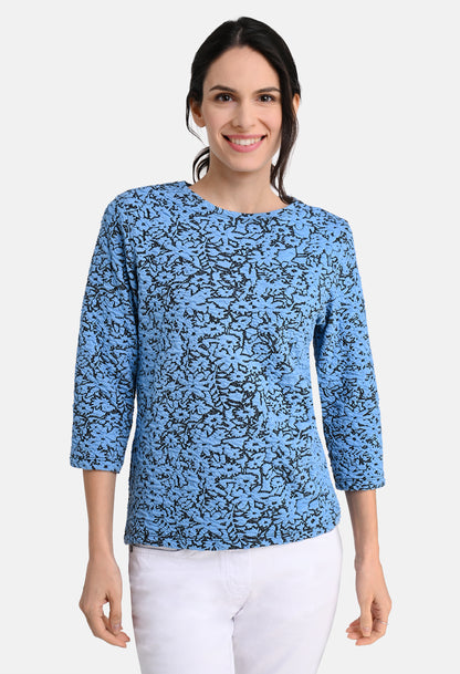 Shirt with jacquard flower pattern