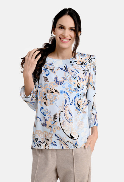 Blouse with ornament print